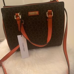 Brand new authentic Calvin Klein purse. Never worn